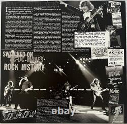 AC/DC Authentic Rare Hand Signed Autographed LP Record with COA