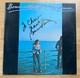 Bonnie Raitt Signed Autographed Sweet Forgiveness Vinyl Record Album To Chris