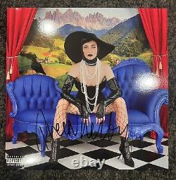 Signed a woman (blue vinyl) autographed by qveen herby