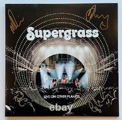 Supergrass band autographed vinyl record album signed by all 4 BECKETT BAS