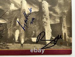 U2 autographed vinyl record album signed by all 4 fire bono edge Beckett BAS coa