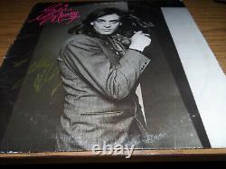 ALBUM VINYLE SIGNÉ D'EDDIE MONEY. DEUX BILLETS POUR LE PARADIS