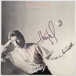 Album Small World signé par Huey Lewis, certificat d'authenticité, preuve exacte, disque vinyle dédicacé