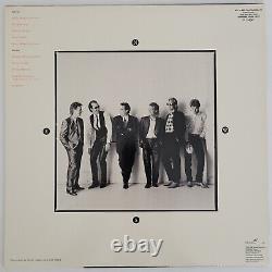 Album Small World signé par Huey Lewis, certificat d'authenticité, preuve exacte, disque vinyle dédicacé