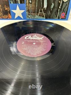 Album Vinyle Signé Autographié de Merle Haggard The Fighting Side