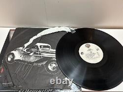 Album vinyle Eliminator de ZZ Top, dédicacé par Billy Gibbons, lot de 2 exemplaires.