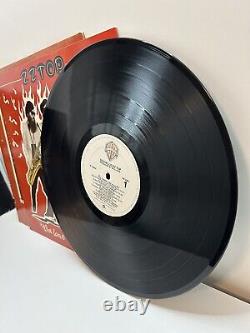 Album vinyle Eliminator de ZZ Top, dédicacé par Billy Gibbons, lot de 2 exemplaires.