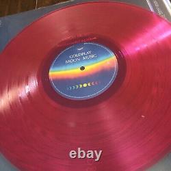 COLDPLAY Vinyle LP Moon Music Eco rose dédicacé autographé. Lunettes + livre