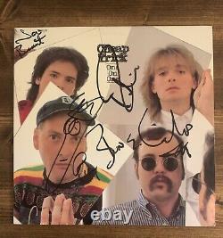 Cheap Trick One on One vinyle signé autographié par l'ensemble du groupe sans COA.
