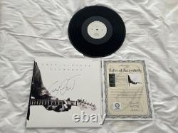 Disque Vinyle LP Slowhand Autographié par Eric Clapton - avec COA et Cadre