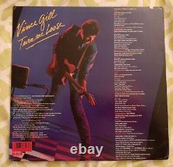 Disque vinyle 'Turn Me Loose' signé par Vince Gill, certificat d'authenticité Beckett BAS #X96021