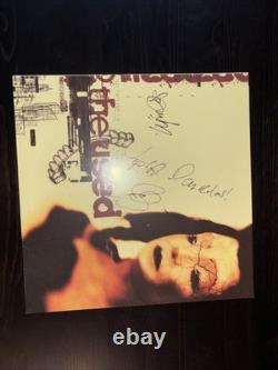 Disque vinyle éponyme de The Used signé et dédicacé
