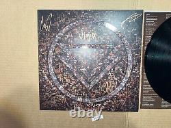 Le Fantôme à l'Intérieur Signe le Disque Vinyle Autographié LP Rise From The Ashes Live