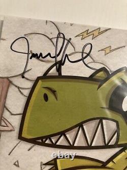 Motion City Soundtrack a signé mon vinyle coloré et numéroté de 'My Dinosaur Life' avec leur autographe.