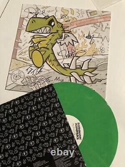 Motion City Soundtrack a signé mon vinyle coloré et numéroté de 'My Dinosaur Life' avec leur autographe.