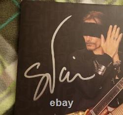 Steve Vai a signé l'autographe de l'enregistrement vinyle 'Inviolate' avec la certification Beckett BAS COA #BJ040658.