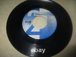 VIXEN JANET GARDNER disque vinyle PROMO signé/autographié 45 LOVE MADE ME
