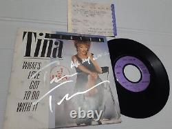 Vinyle autographié 7' de TINA TURNER : Qu'est-ce que l'amour a à voir avec ça, signé en concert live.